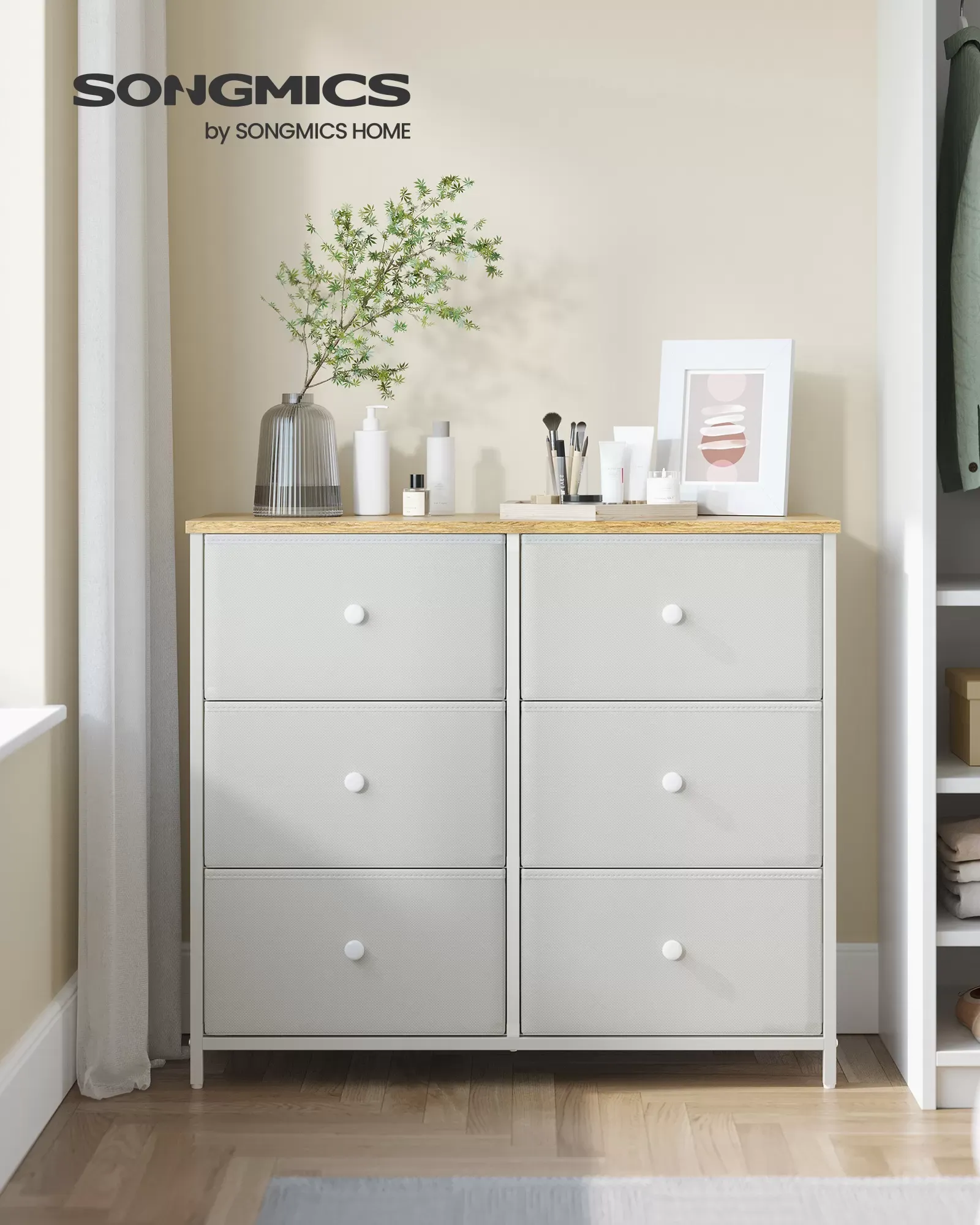 Illustration numéro 2 du produit Commode avec 6 tiroirs en tissu blanc et couleur boisée