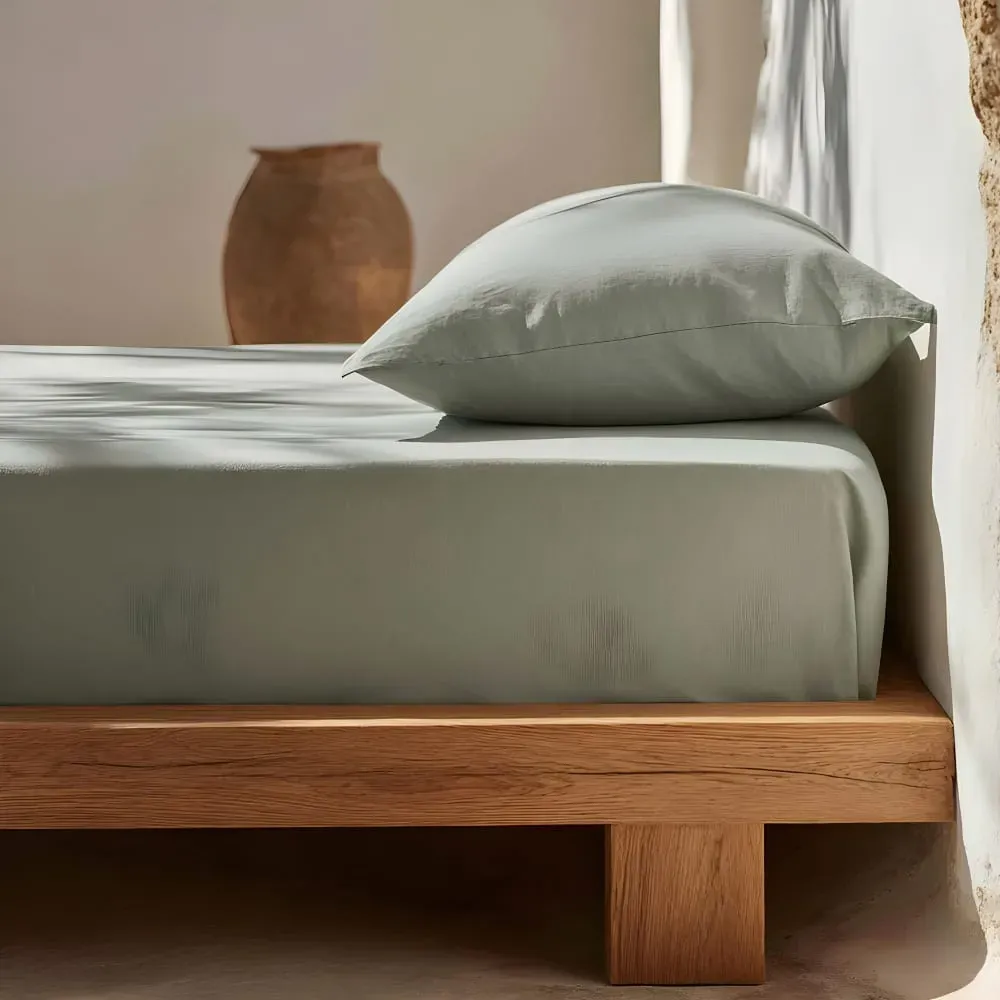 Illustration numéro 2 du produit Drap-housse en 100% coton aqua marine 140x200x30 cm