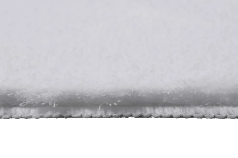 Illustration numéro 2 du produit Tapis de bain doux blanc uni 55x65