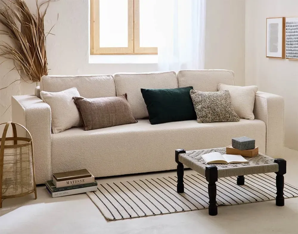 Illustration numéro 2 du produit Canapé droit convertible 3 places en tissu bouclette beige