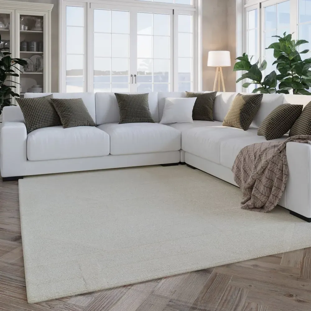 Illustration numéro 2 du produit Tapis pure laine tufté main crème 200x300