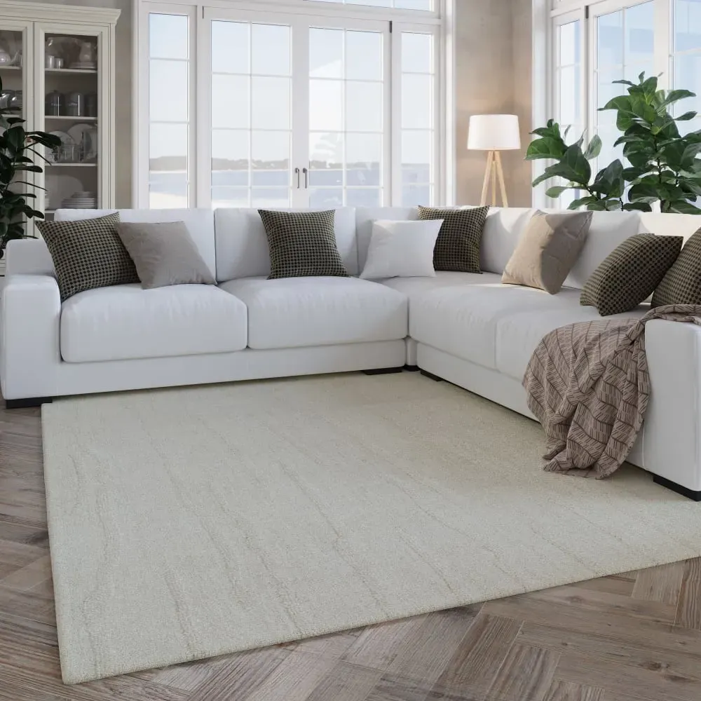 Illustration numéro 2 du produit Tapis pure laine tufté main crème 110x170
