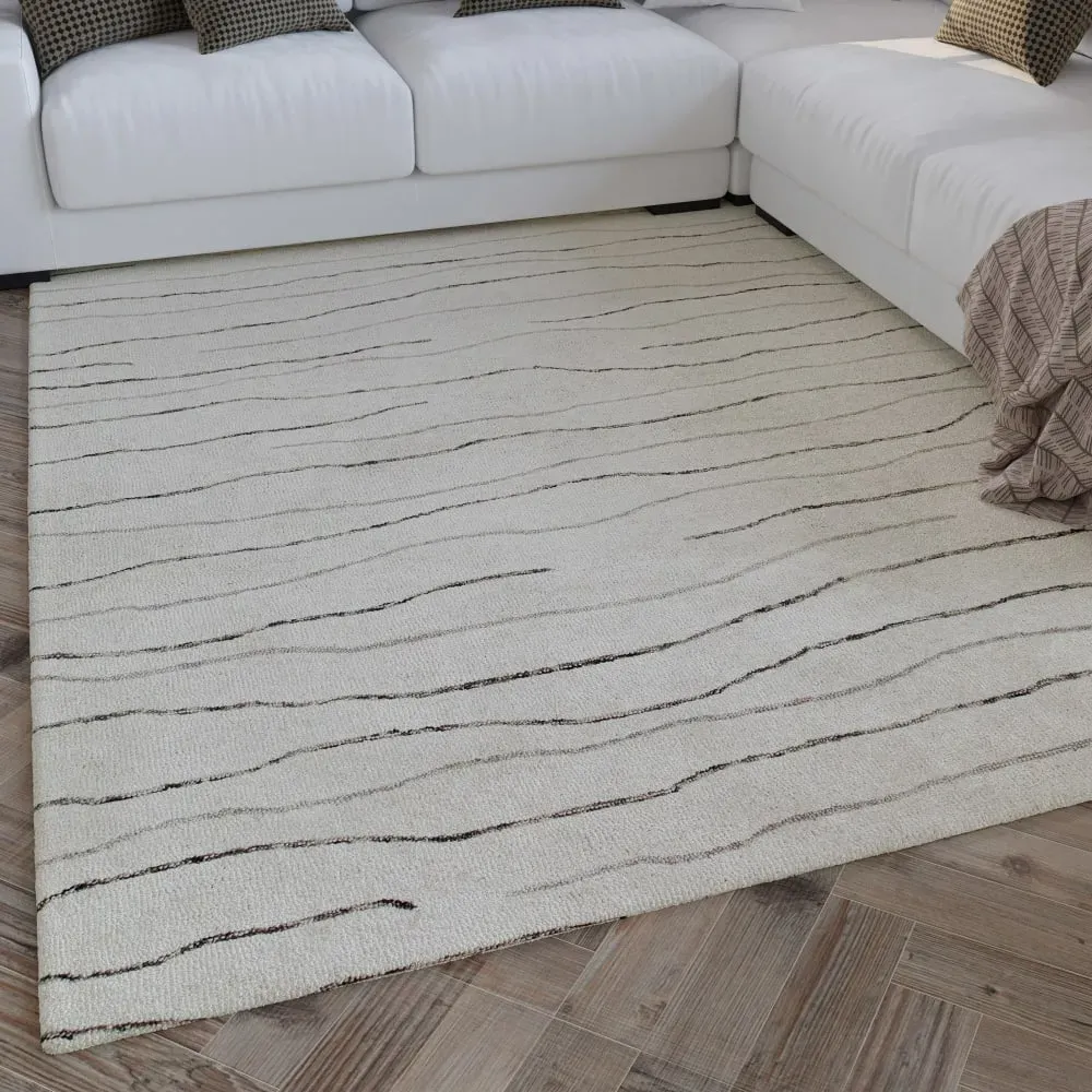 Illustration numéro 2 du produit Tapis rond pure laine tufté main crème 200 cm