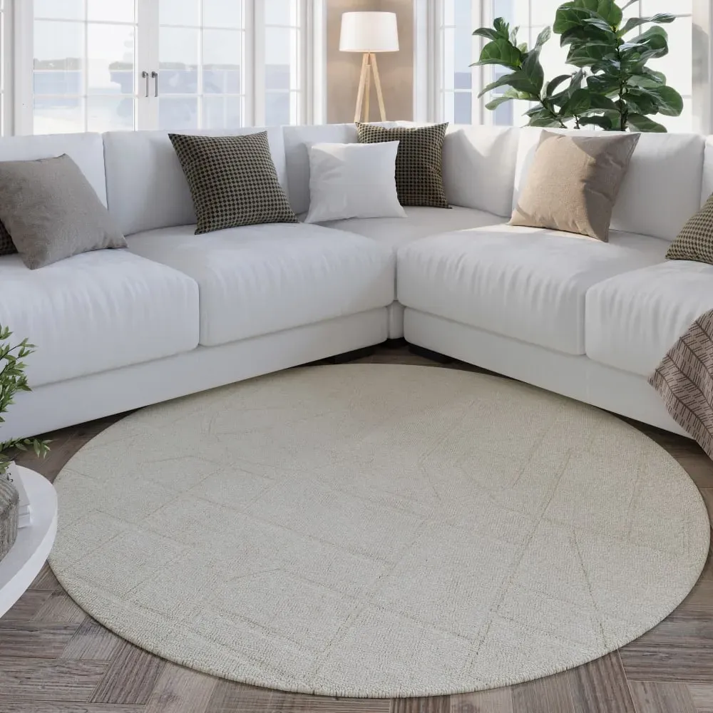 Illustration numéro 2 du produit Tapis  rond tufté main crème 200 cm