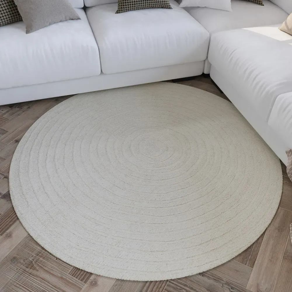 Illustration numéro 2 du produit Tapis rond pure laine tufté main crème 180 cm