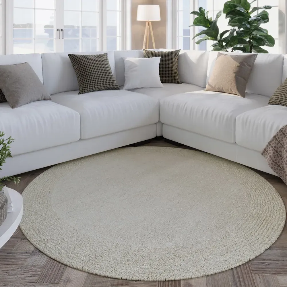Illustration numéro 2 du produit Tapis rond pure laine tufté main crème 180 cm