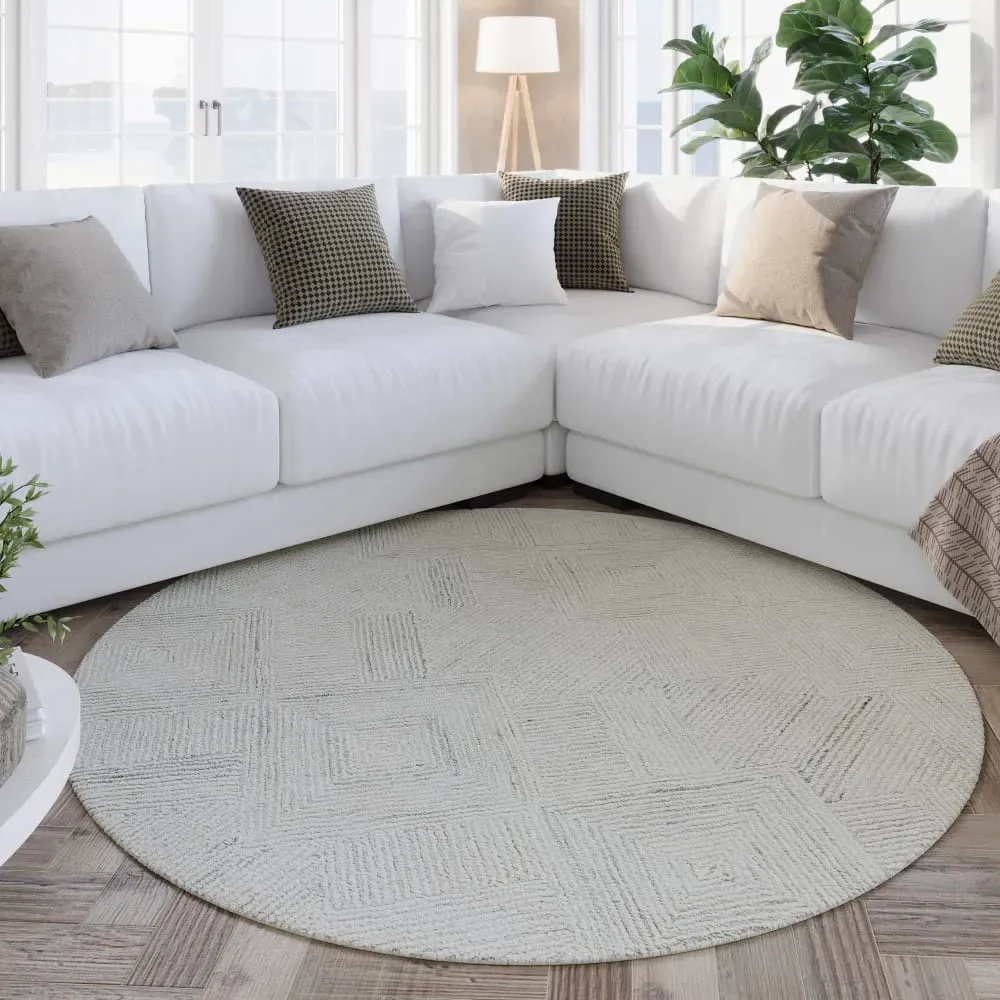 Illustration numéro 2 du produit Tapis rond écru design tufté main à relief 180 rd.