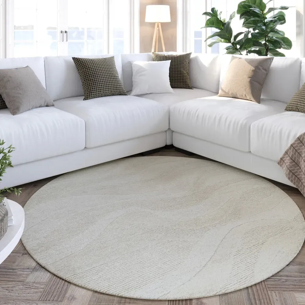 Illustration numéro 2 du produit Tapis rond écru design tufté main à relief 180 rd.