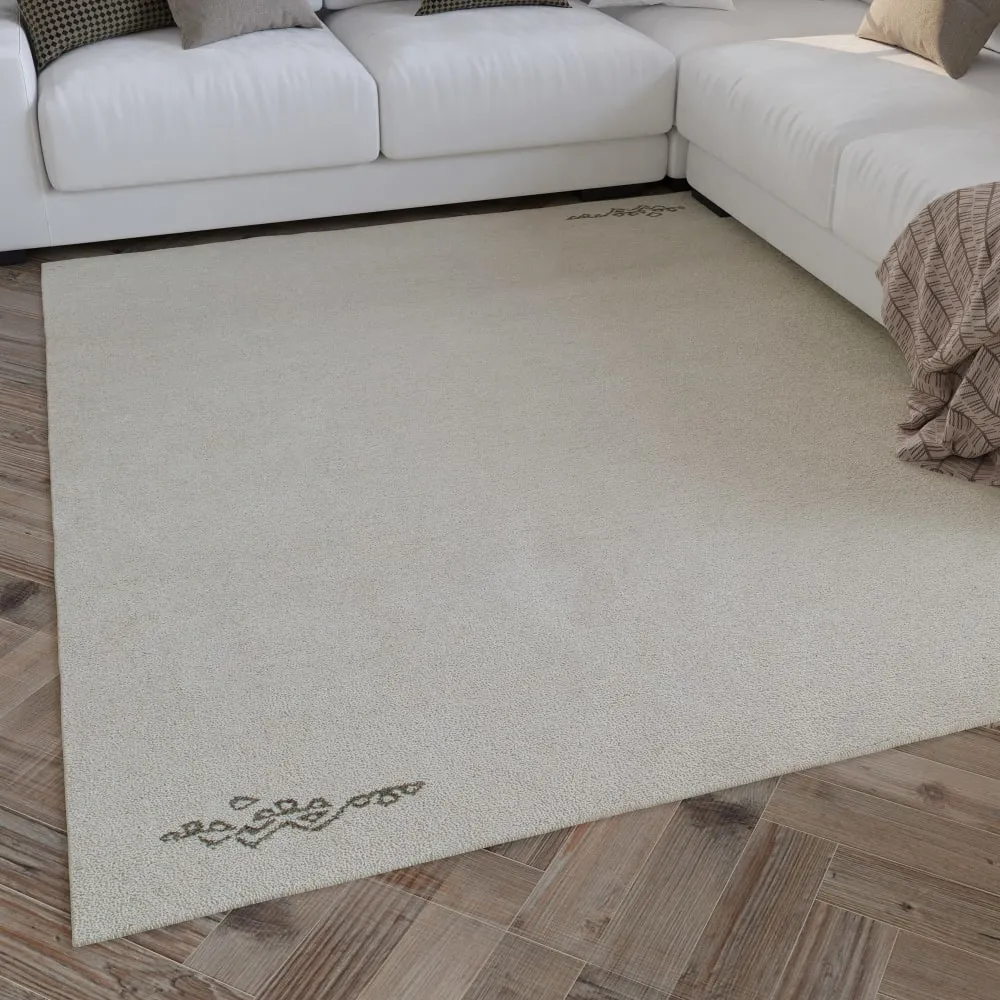 Illustration numéro 2 du produit Tapis pure laine écru  tufté main motif discret 160x230