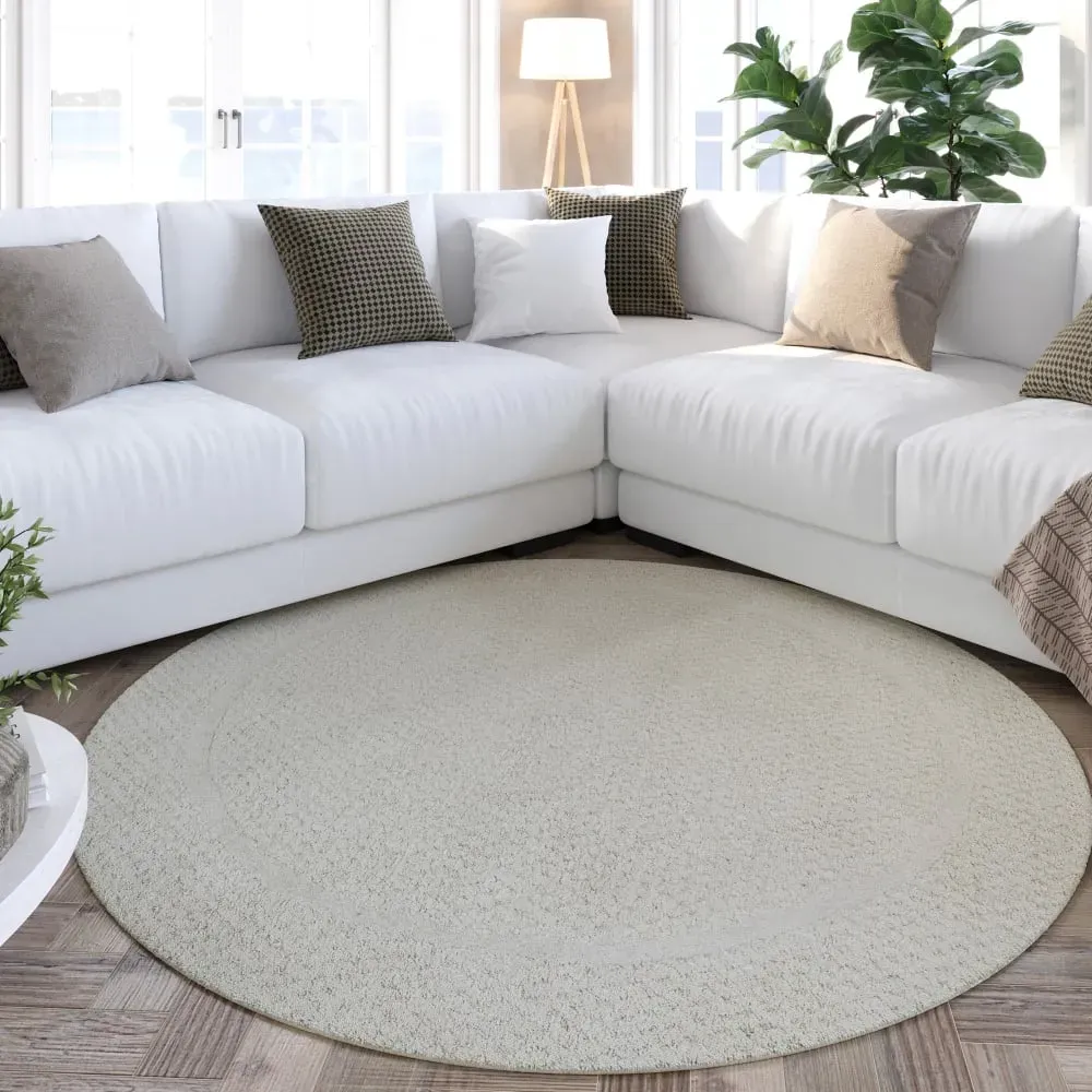 Illustration numéro 2 du produit Tapis rond écru design tufté main à relief 200 rd.