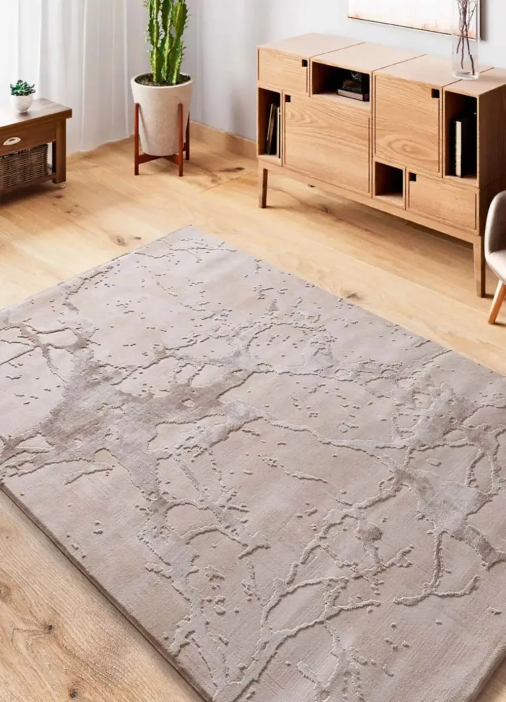 Illustration numéro 2 du produit Tapis à relief effet marbre beige 115x170 cm