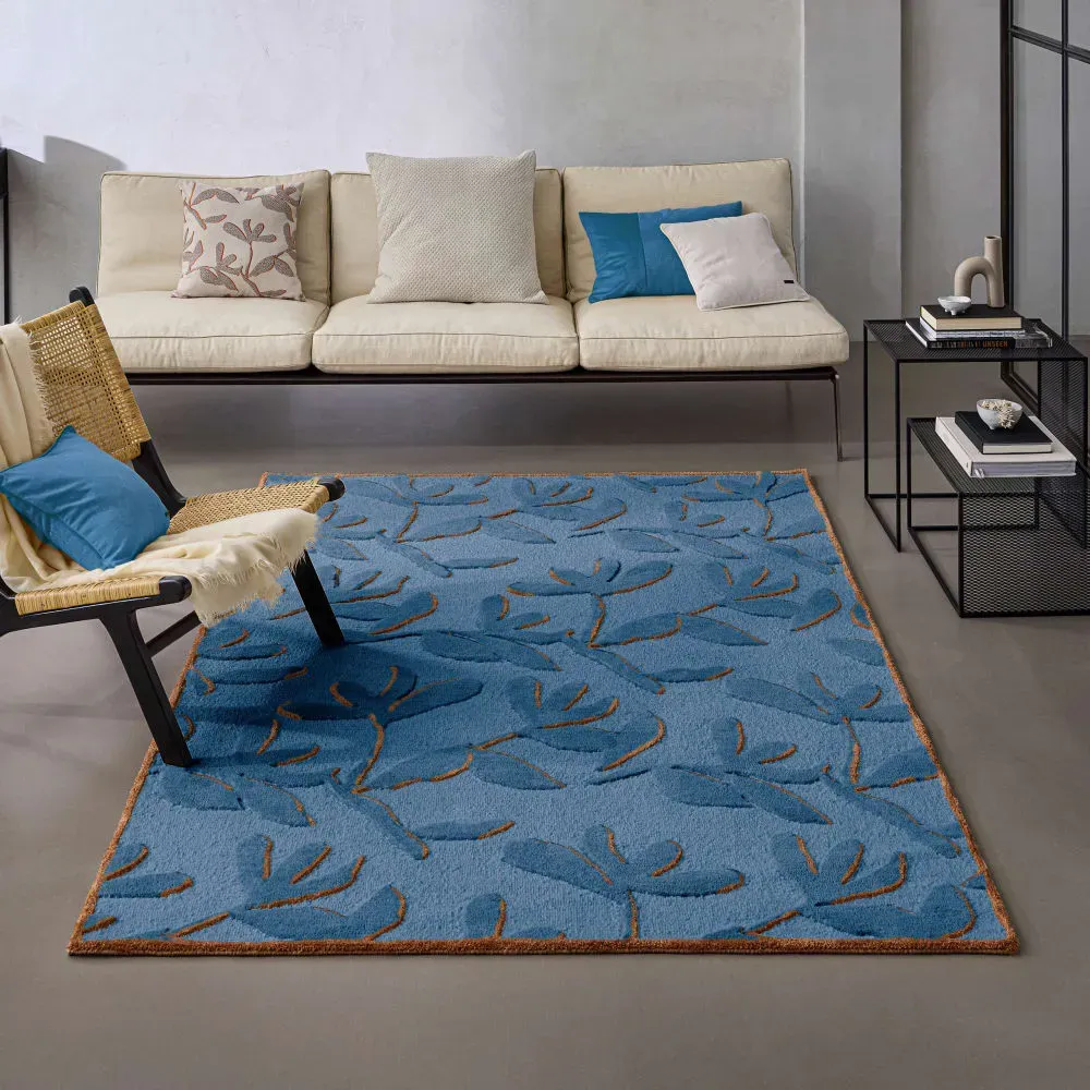 Illustration numéro 2 du produit Tapis design floral tufté pure laine bleu et brique  80x150