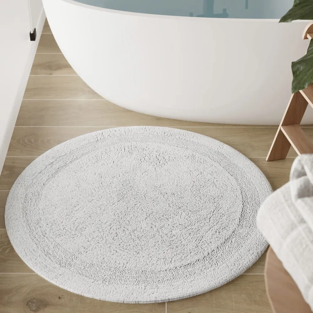 Illustration numéro 2 du produit Tapis de bain blanc rond en coton 80 rd.