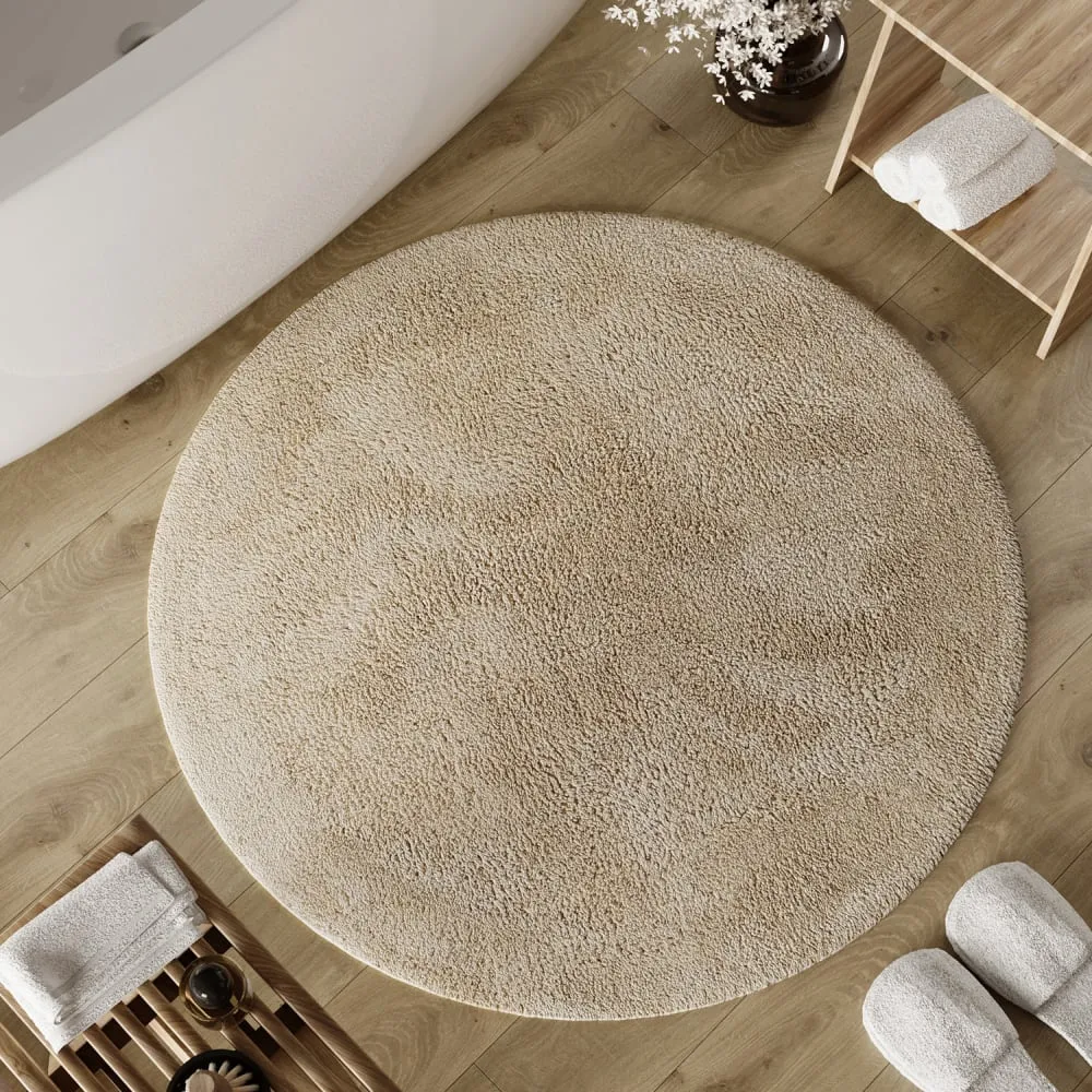 Illustration numéro 2 du produit Tapis de bain beige rond en coton 80 rd.