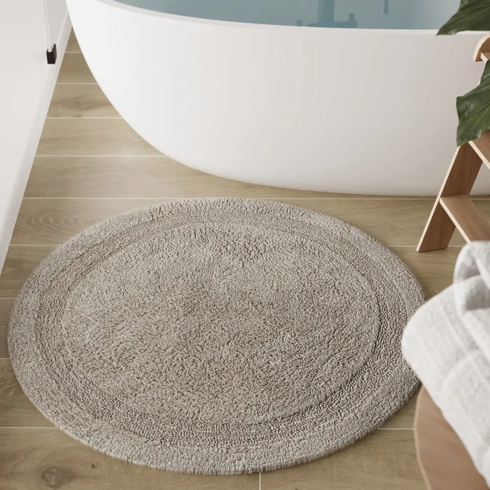Illustration numéro 2 du produit Tapis de bain greige rond en coton 80 rd.