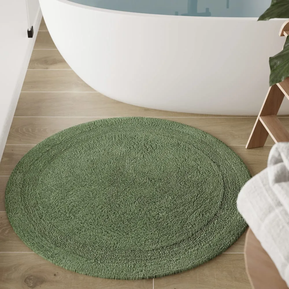Illustration numéro 2 du produit Tapis de bain vert rond en coton 80 rd.