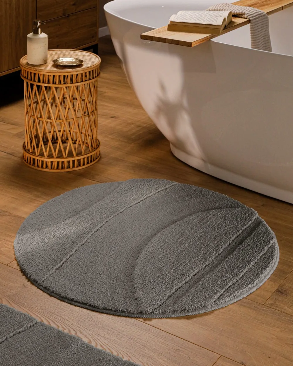Illustration numéro 2 du produit Tapis de bain rond à relief gris basalte 80 rd.