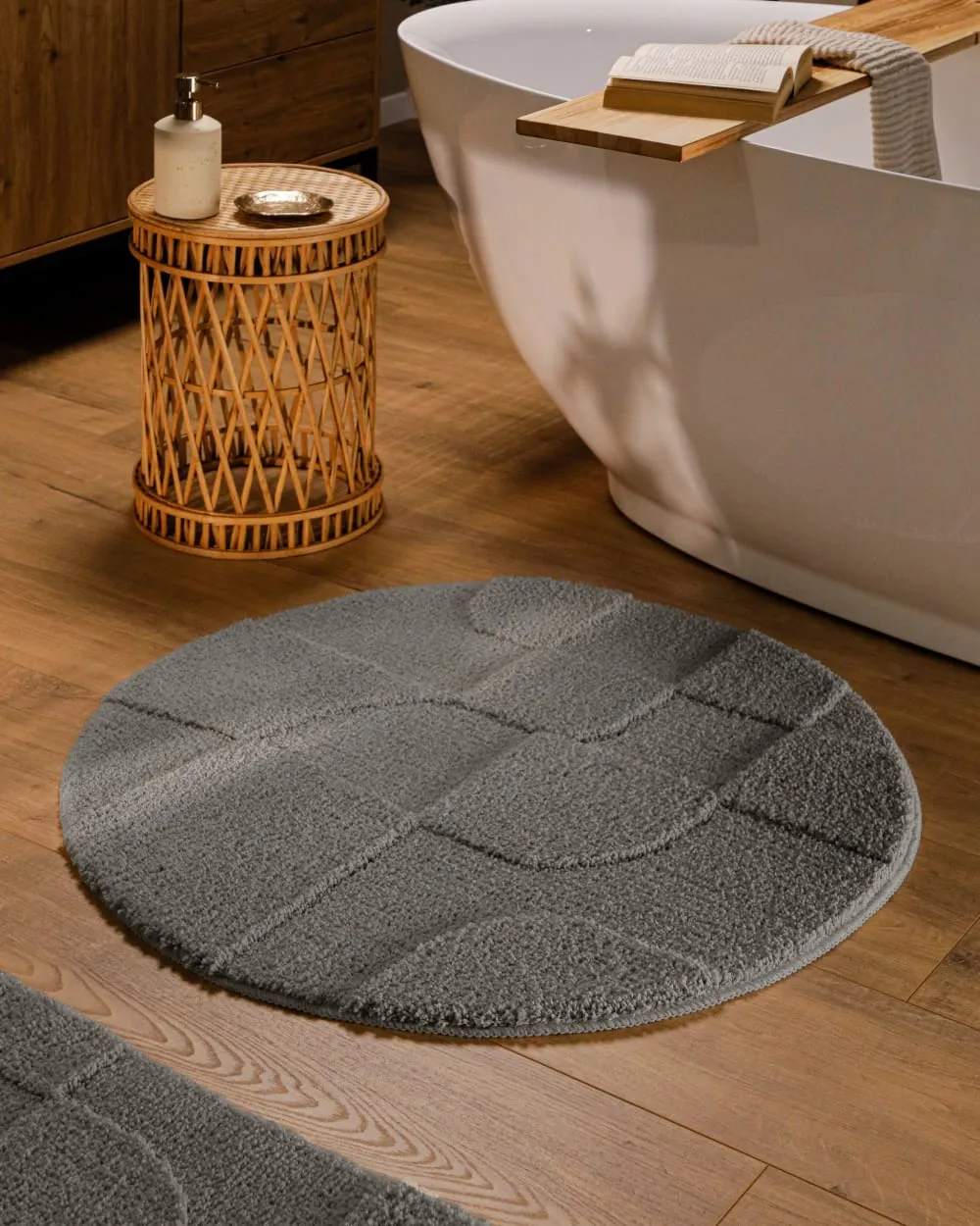 Illustration numéro 2 du produit Tapis de bain rond à relief gris basalte 80 rd.