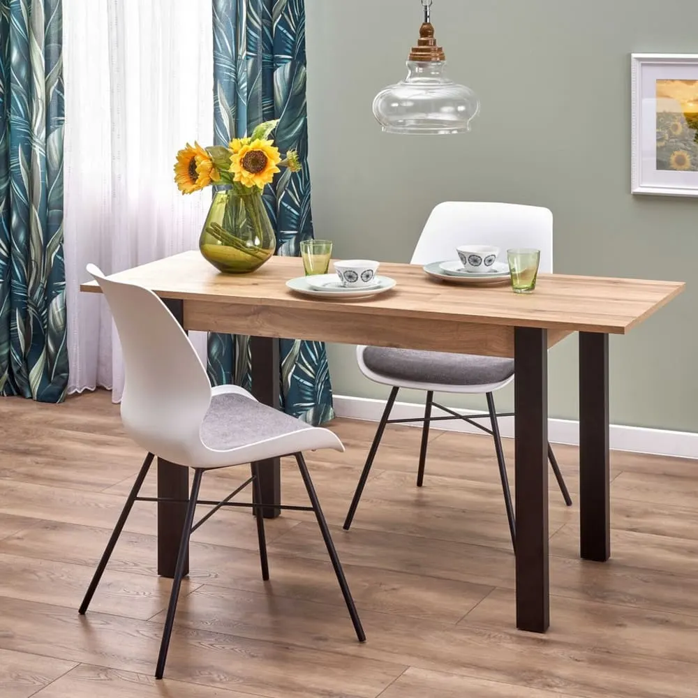 Illustration numéro 2 du produit Table à manger extensible couleur chêne avec pieds noirs 100-135cm