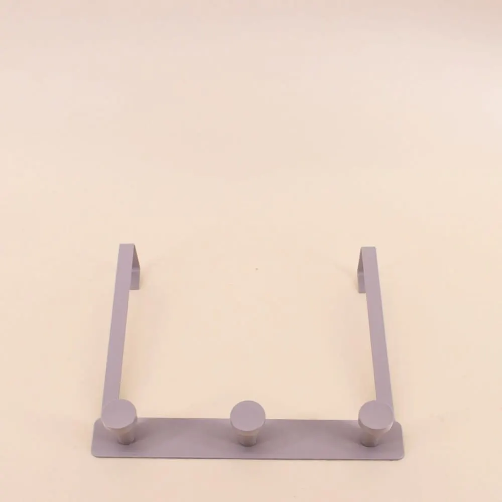 Illustration numéro 2 du produit Patère de porte en fer 3 gris têtes