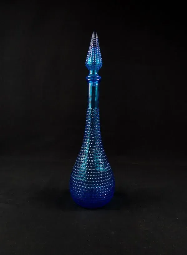 Illustration numéro 2 du produit Carafe génie bouteille empoli en verre moulé pressé bleu vintage années 70
