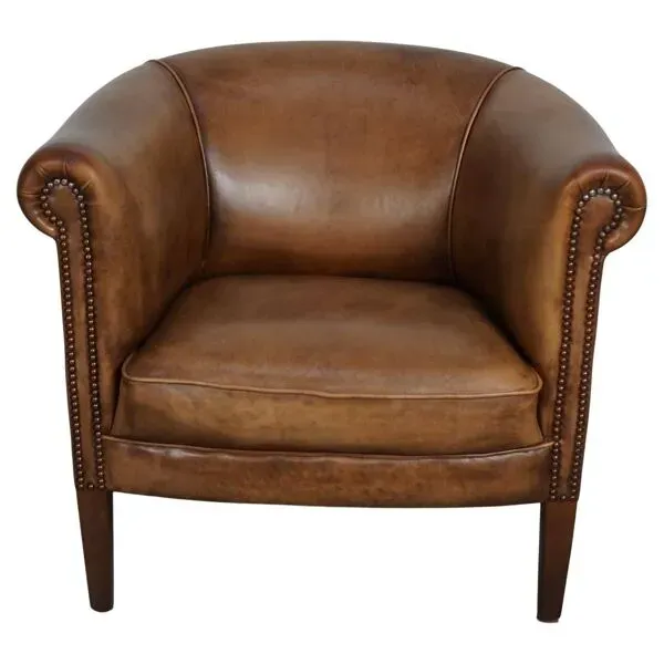 Illustration numéro 2 du produit Fauteuil club en cuir couleur cognac néerlandais vintage