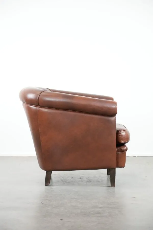 Illustration numéro 2 du produit Fauteuil club en cuir de vache couleur cognac de style anglais