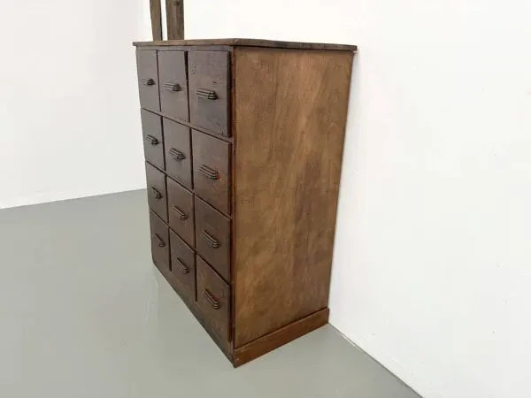 Illustration numéro 2 du produit Meuble de métier ancien à 12 tiroirs, circa 1900