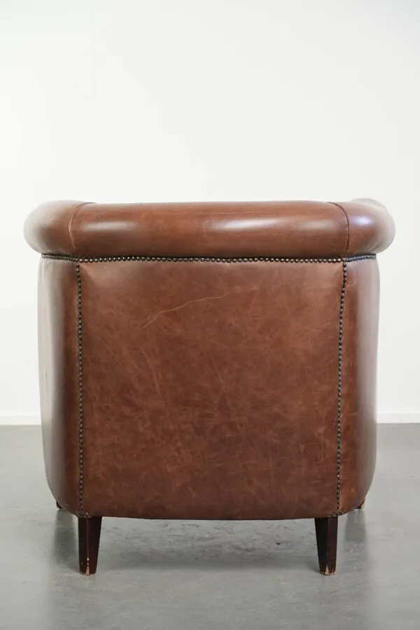 Illustration numéro 2 du produit Fauteuil club en cuir de vache couleur cognac de style anglais