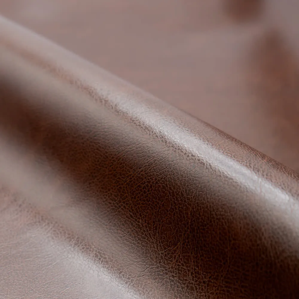 Illustration numéro 3 du produit Fauteuil marron en croute de cuir enduite