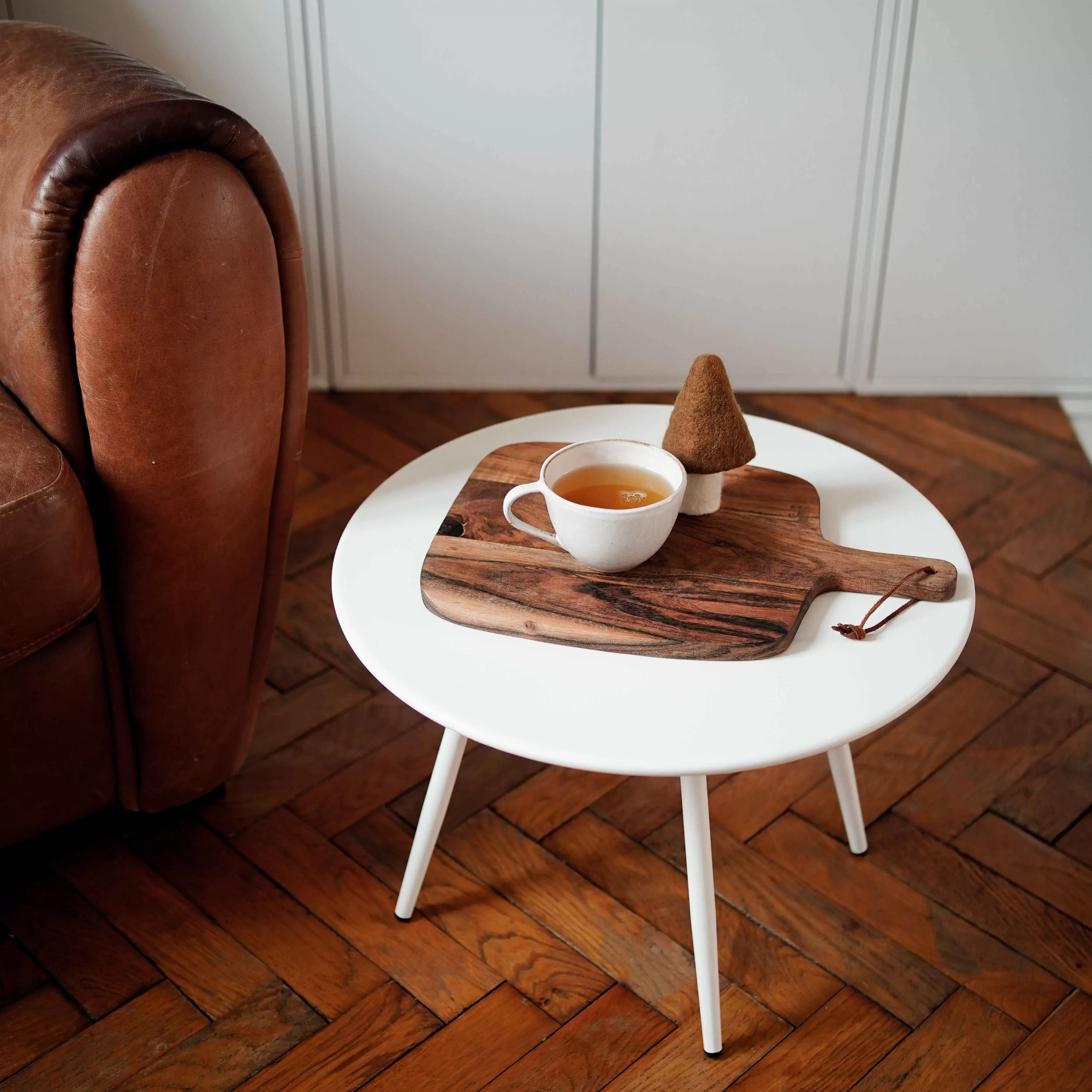 Illustration numéro 3 du produit Table basse ronde en métal blanche