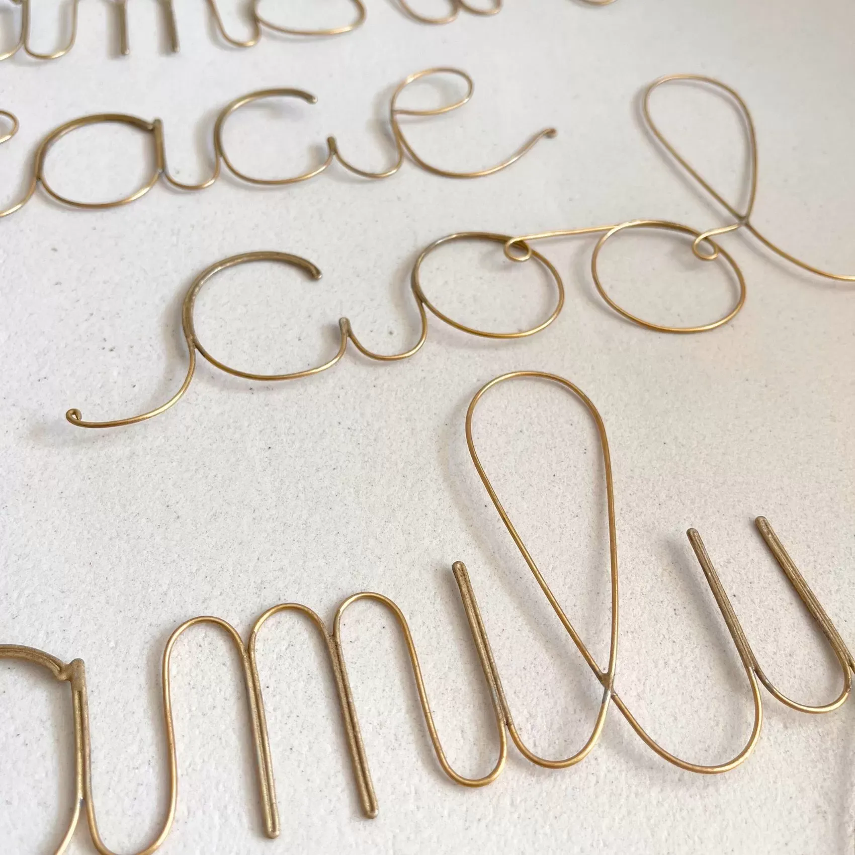 Illustration numéro 3 du produit Mot fil de laiton doré ''family'' métal doré 0.5 x 24