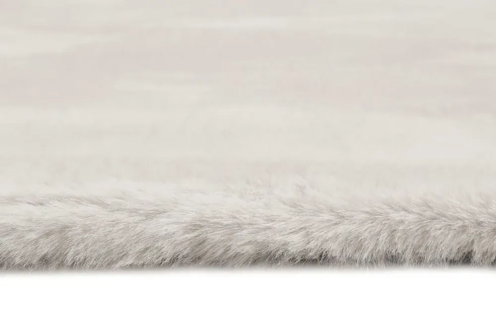 Illustration numéro 3 du produit Tapis effet peau de lapin doux tufté gris pour salon, chambre 60x90