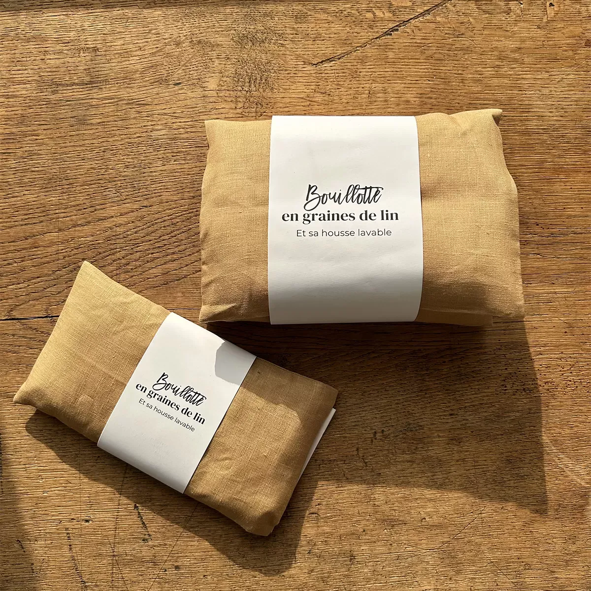 Illustration numéro 3 du produit Bouillotte en graines de lin doré 10x20