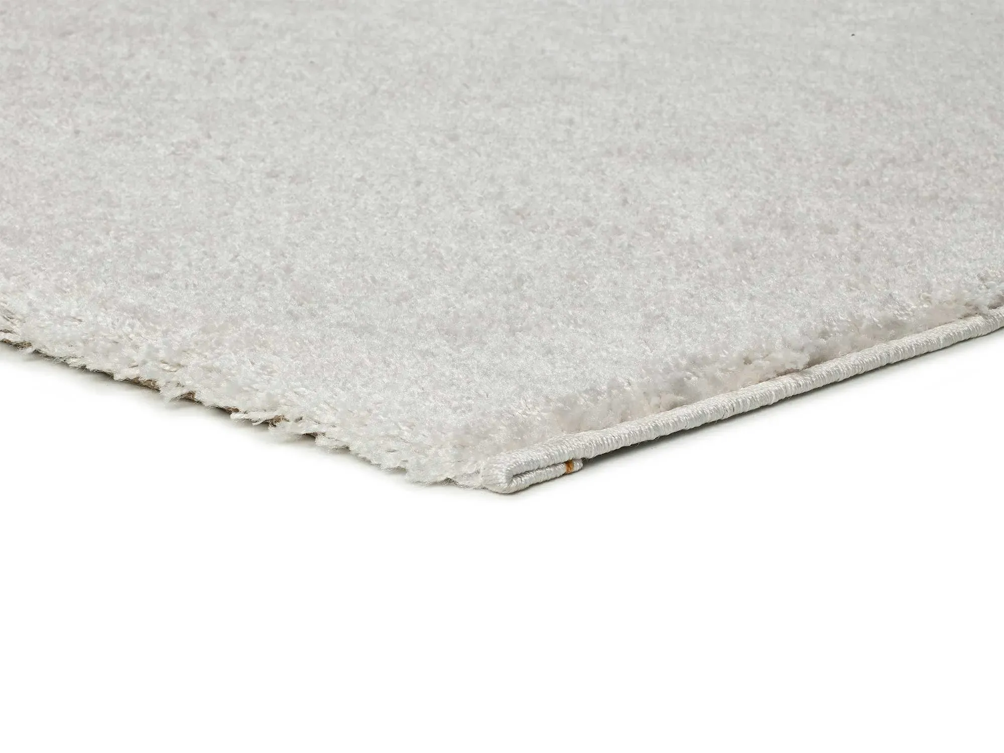 Illustration numéro 3 du produit Tapis descente de lit shaggy blanc 60x120 cm