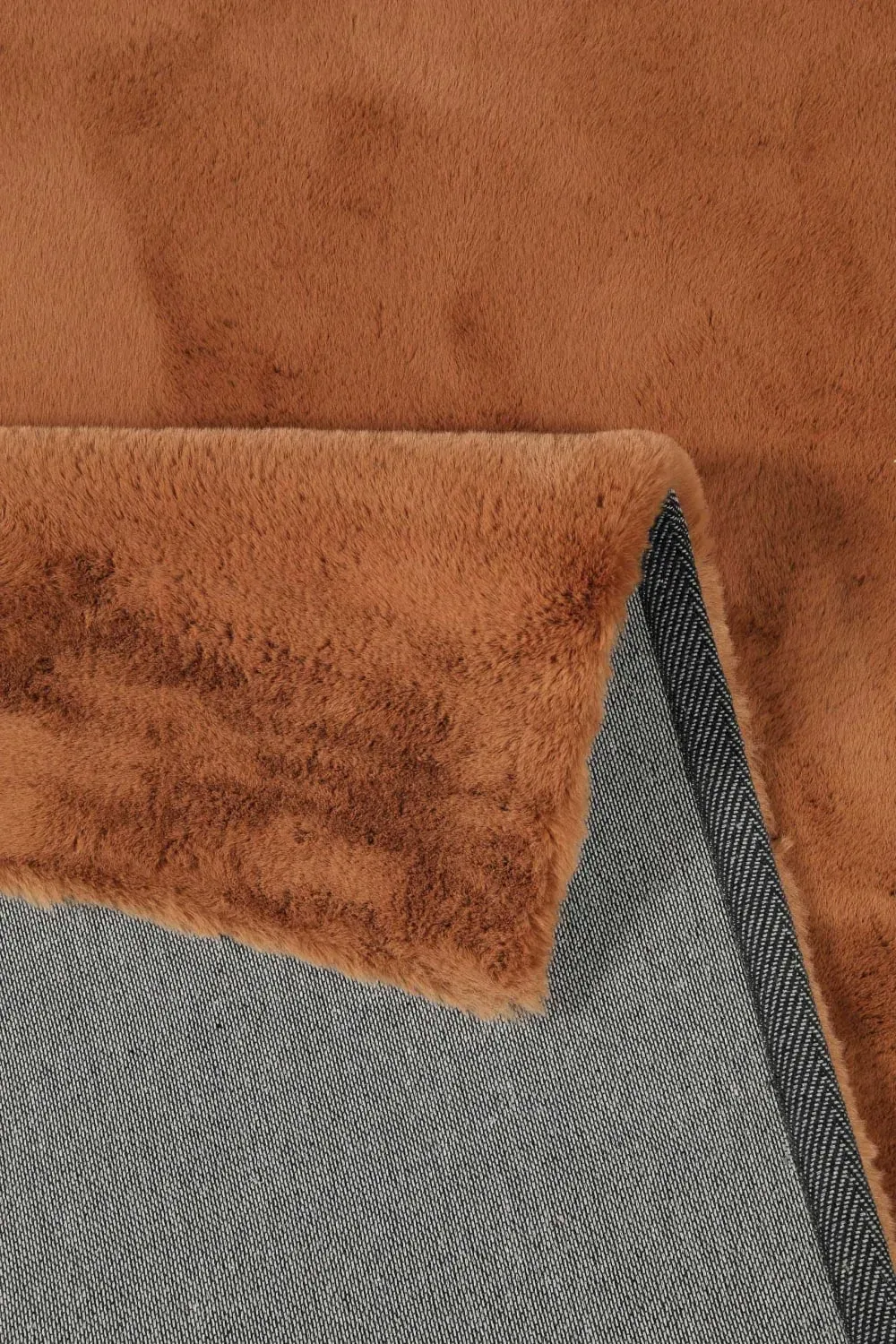 Illustration numéro 3 du produit Tapis imitation fourrure lapin doux tufté cuivré 70x140