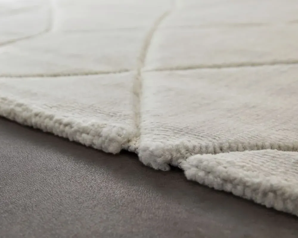 Illustration numéro 3 du produit Tapis à relief effet optique blanc cassé 80x150