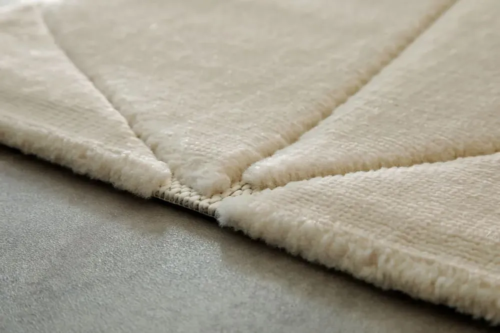 Illustration numéro 3 du produit Tapis à relief effet optique beige sable 200x290