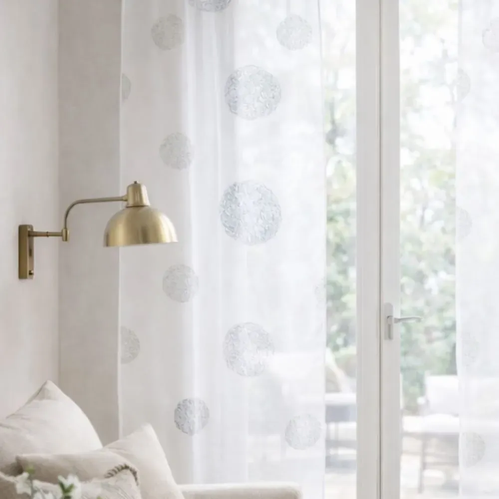 Illustration numéro 3 du produit Voilage de fenêtre ronds brodés polyester blanc 90x210 cm