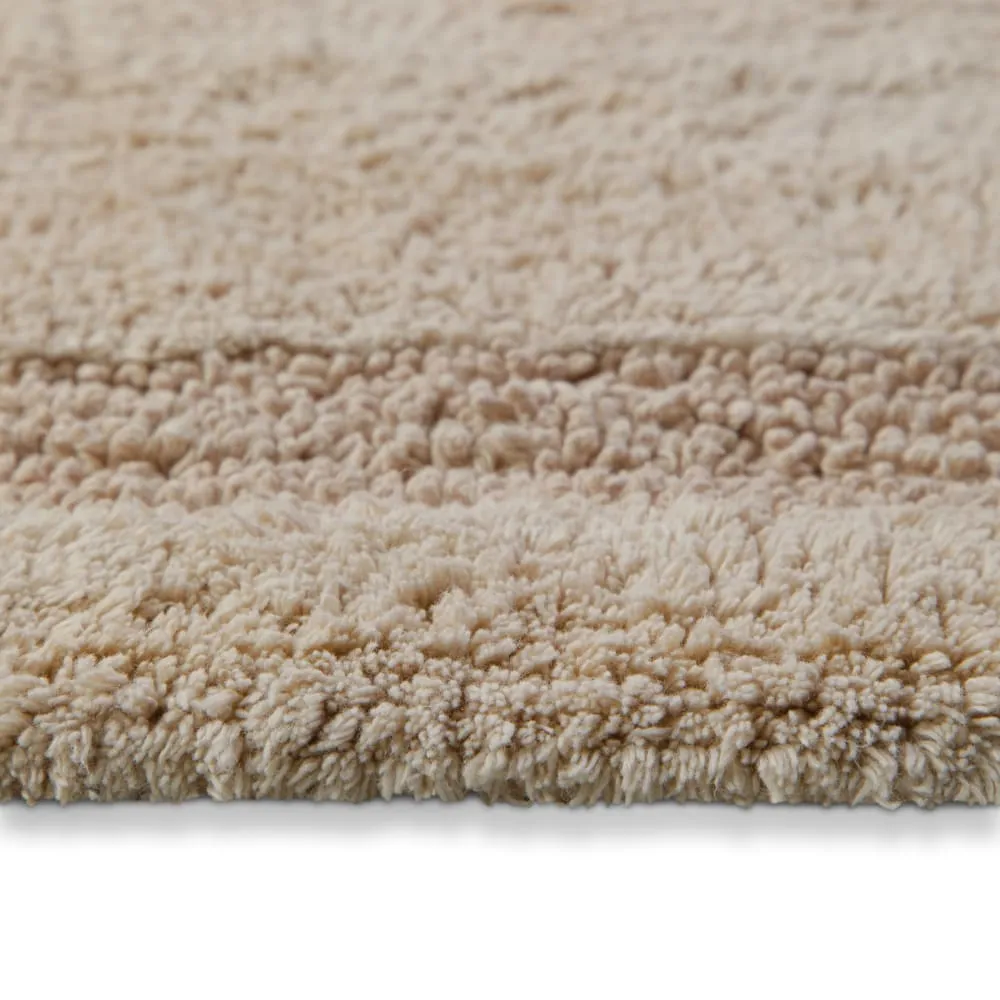 Illustration numéro 3 du produit Tapis de bain beige rond en coton 80 rd.