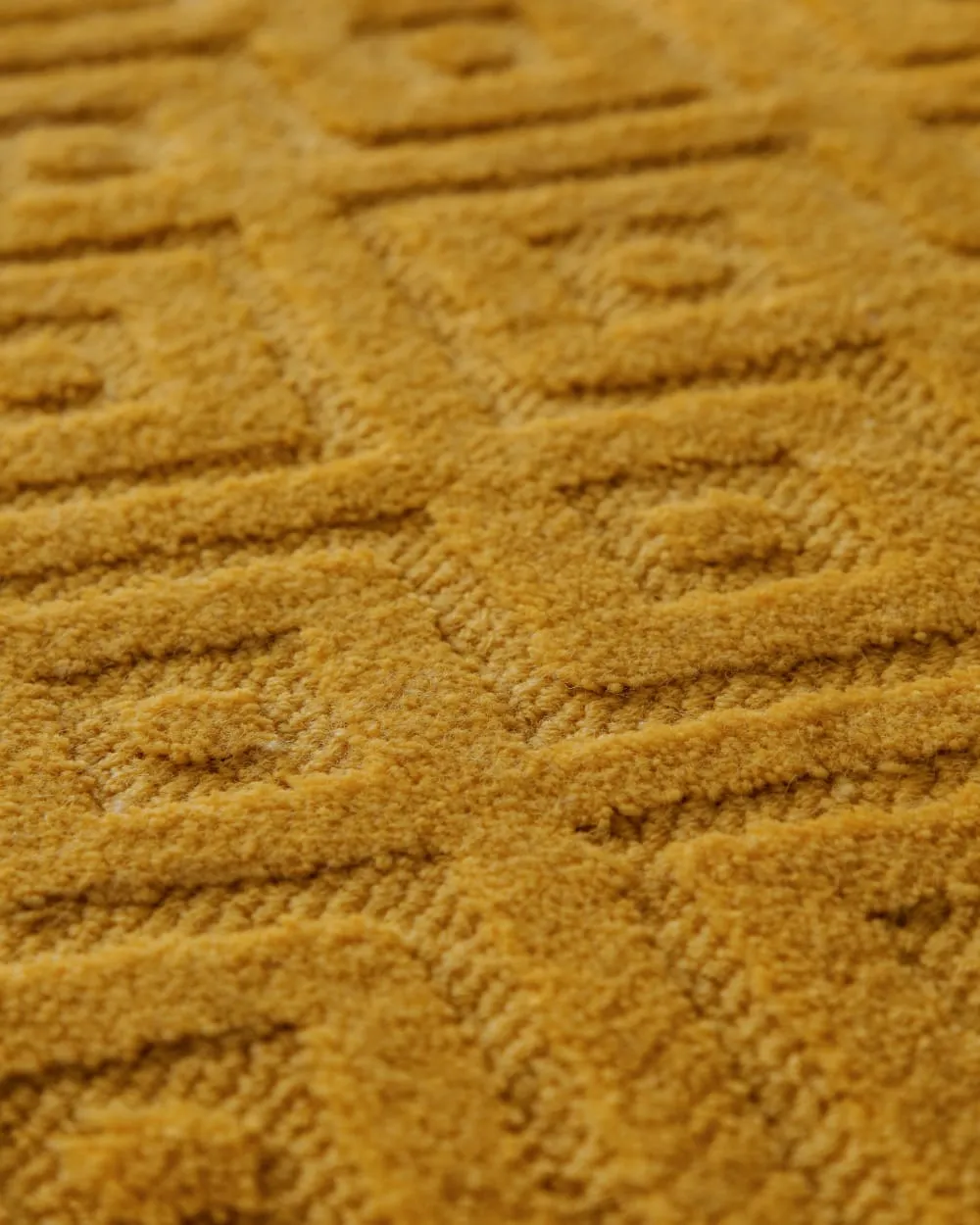 Illustration numéro 3 du produit Tapis en laine avec relief jaune 140x200