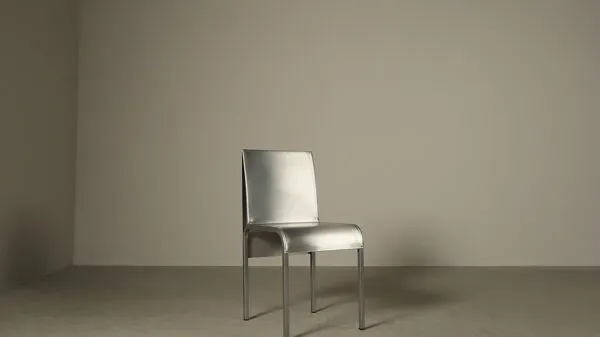 Illustration numéro 3 du produit Ensemble de six chaises de salle à manger en acier inoxydable postmodernistes datant d'environ 1980-1990.