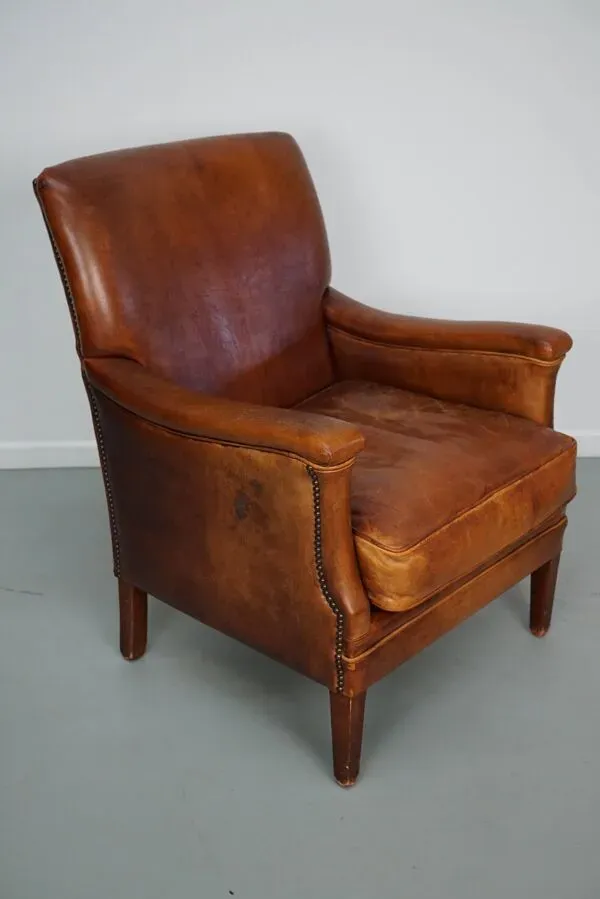 Illustration numéro 3 du produit Fauteuil club en cuir couleur cognac néerlandais vintage