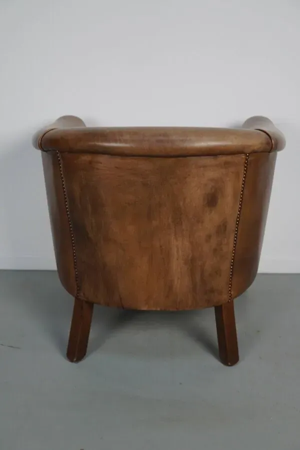 Illustration numéro 3 du produit Fauteuil club en cuir couleur cognac néerlandais vintage