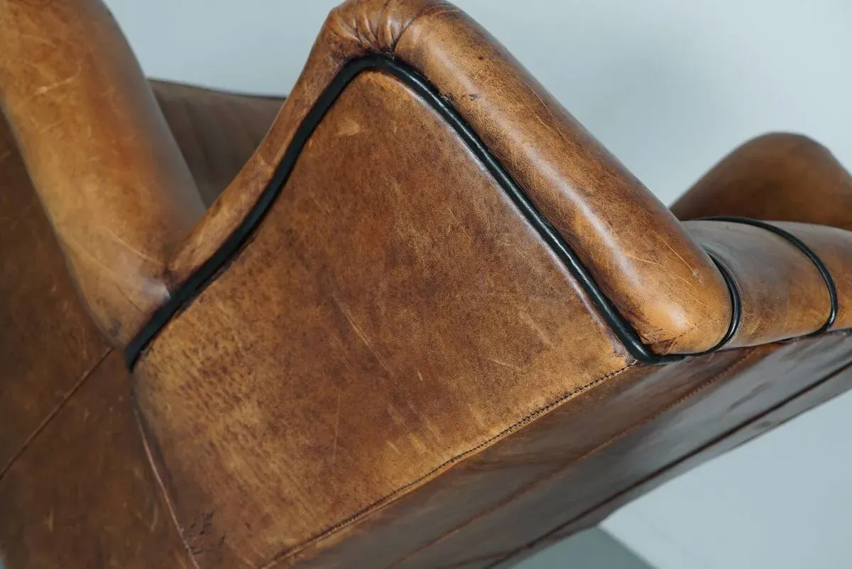 Illustration numéro 3 du produit Fauteuil hollandais vintage en cuir cognac