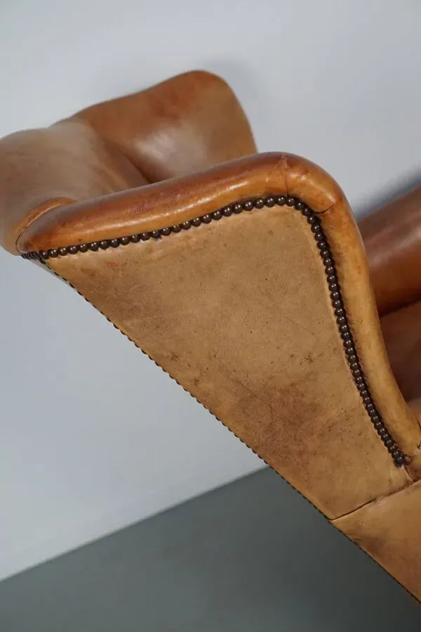 Illustration numéro 3 du produit Fauteuil club en cuir couleur cognac néerlandais vintage