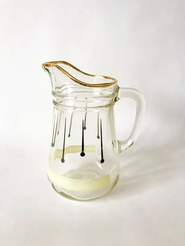 Illustration numéro 3 du produit pichet en verre à motifs psyché noirs liseré doré années 60-70