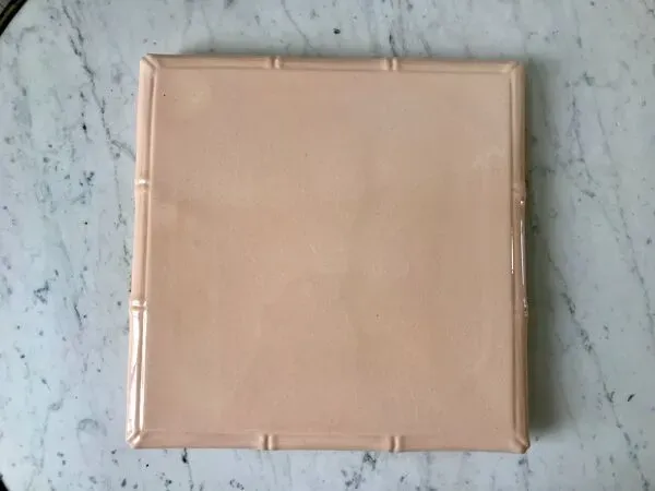 Illustration numéro 3 du produit Dessous de plat en faïence rose effet bambou digoin sarreguemines années 50