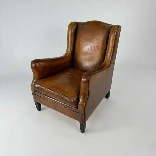 Illustration numéro 4 du produit Fauteuil club en cuir de mouton, années 1970
