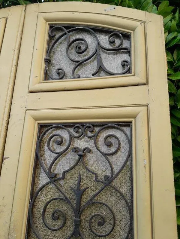 Illustration numéro 4 du produit Porte d'entrée cintrée double en chêne, grilles et verre, XIXème